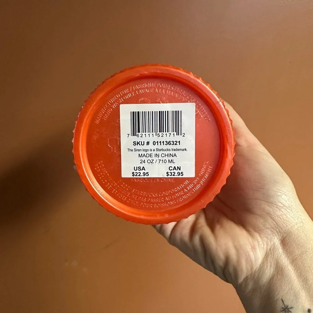 Orange venti Starbucks tumbler